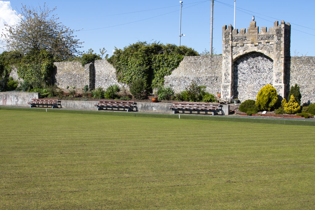 A view across the bowling green to the old wall