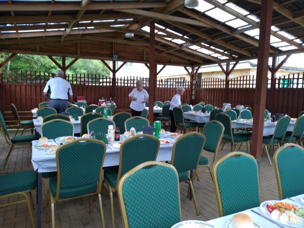 The outdoor gazebo set up for a celebratory meal